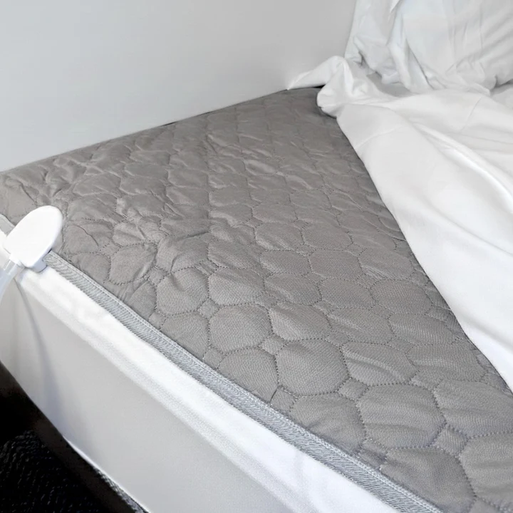 The Cooly cooling pad placed on the mattress